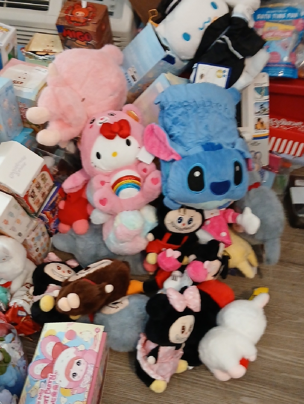 Sanrio Pink Hello Kitty Rainbow Plush and Blue Stitch Companion Set